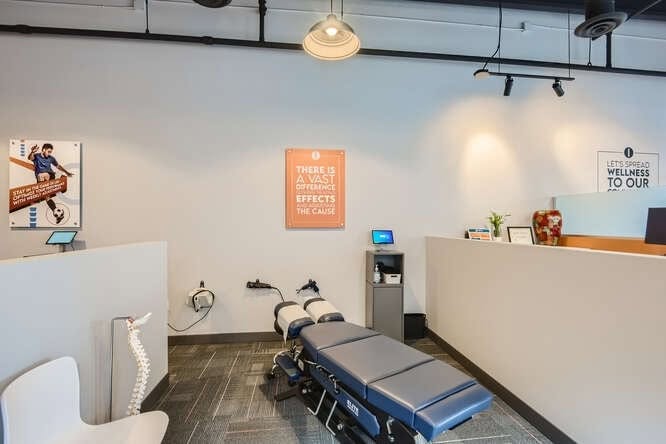 Treatment booth with table and SoftWave equipment