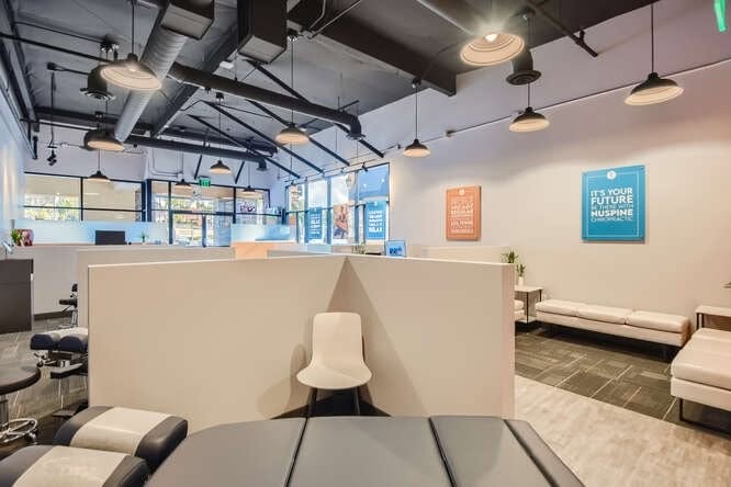 Open treatment floor with private booths