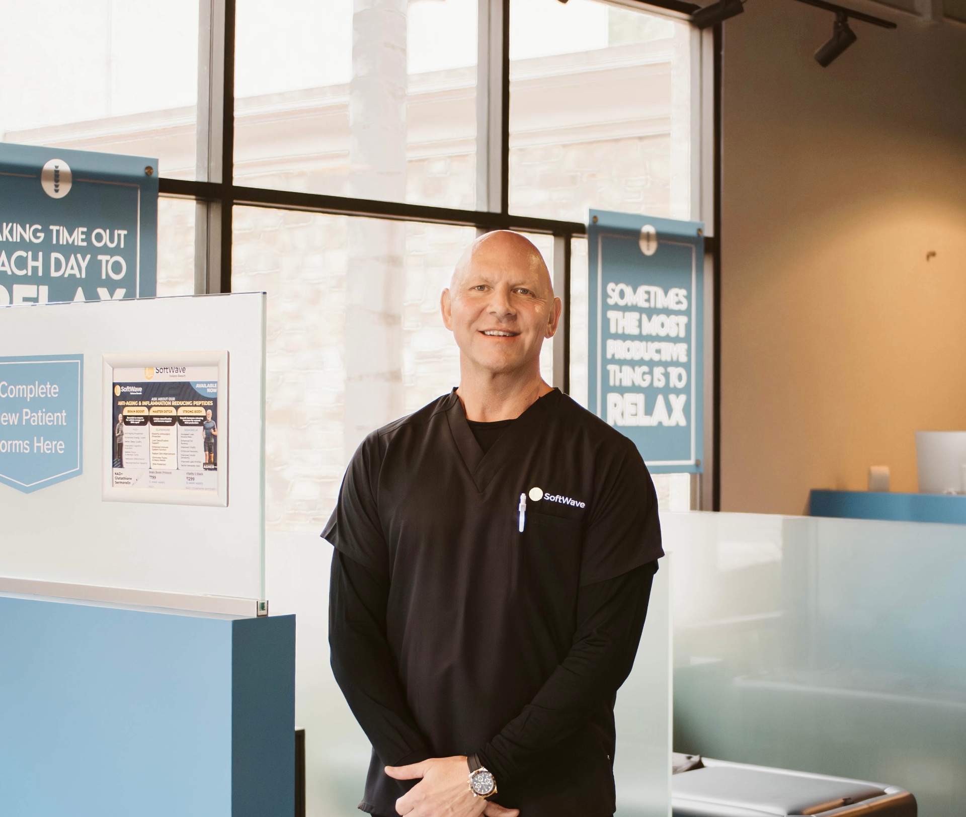 Dr. Kurt O'Neill smiling inside the SoftWave Solana Beach clinic