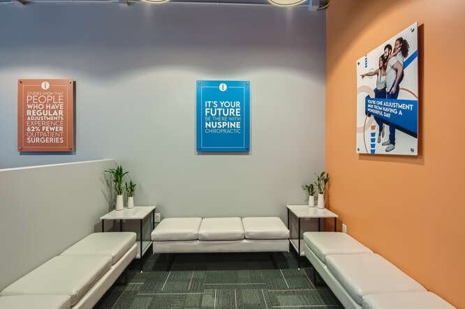 Waiting area seating with wellness posters
